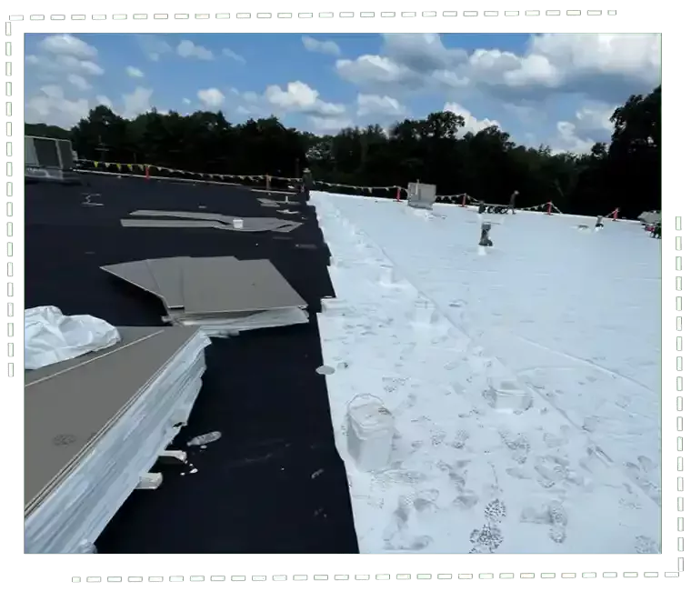 White commercial rooftop with single-ply membrane installed by H.Kulak & Son