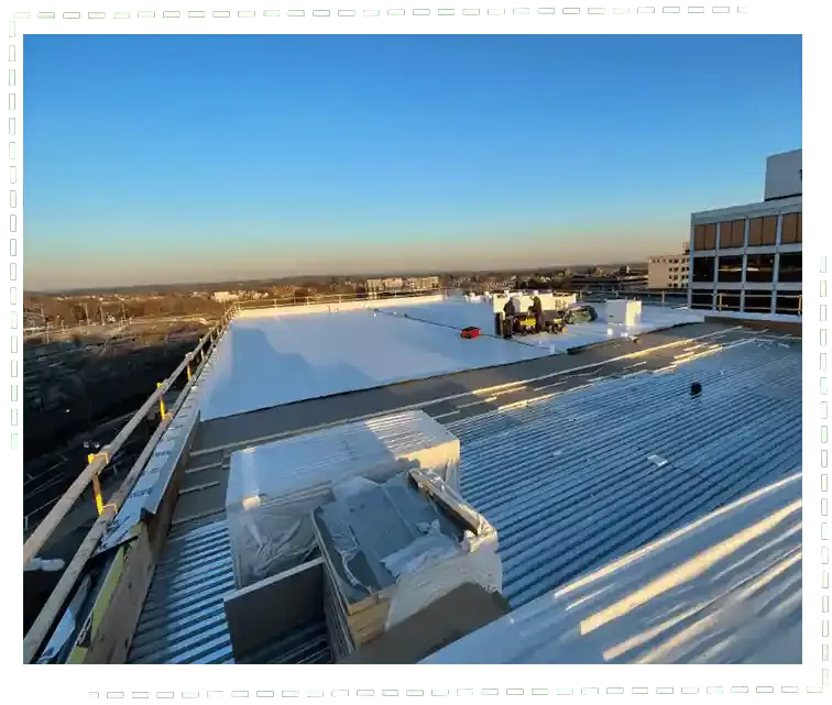 H. Kulak & Son LLC white commercial rooftop
